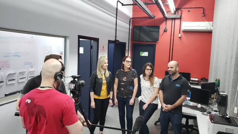 Explaining project to local TV.