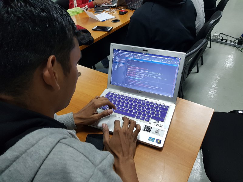 Our teammate Edgar Perez working on our frond end with Java programming language!