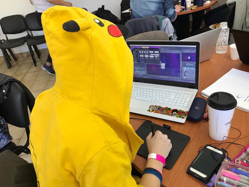 Pikachu is designing the main character of our game: An adorable SPACE CAT! 