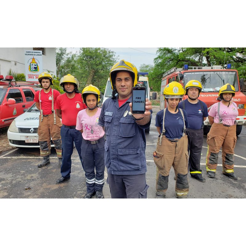 Firefighters collaborating with FIRE TAMERS